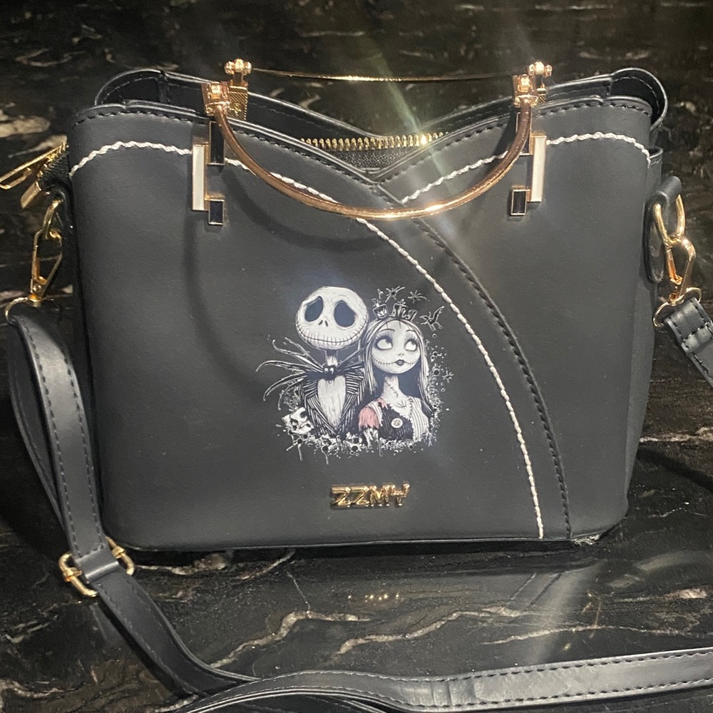 Black Crossbody Bag with Gold Accents